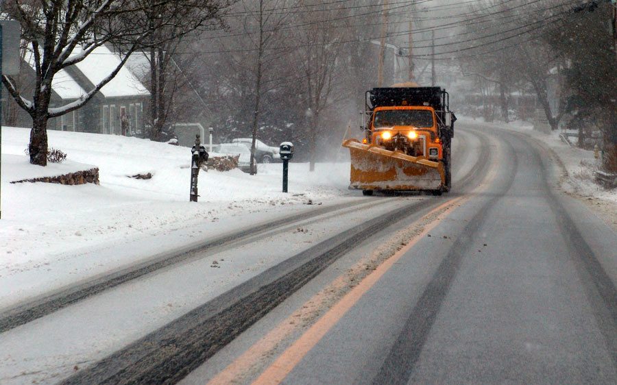 snow storm and plow