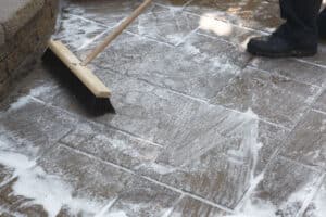 A soapy paver surface ready for cleaning, showcasing the outdoor concrete pavers.