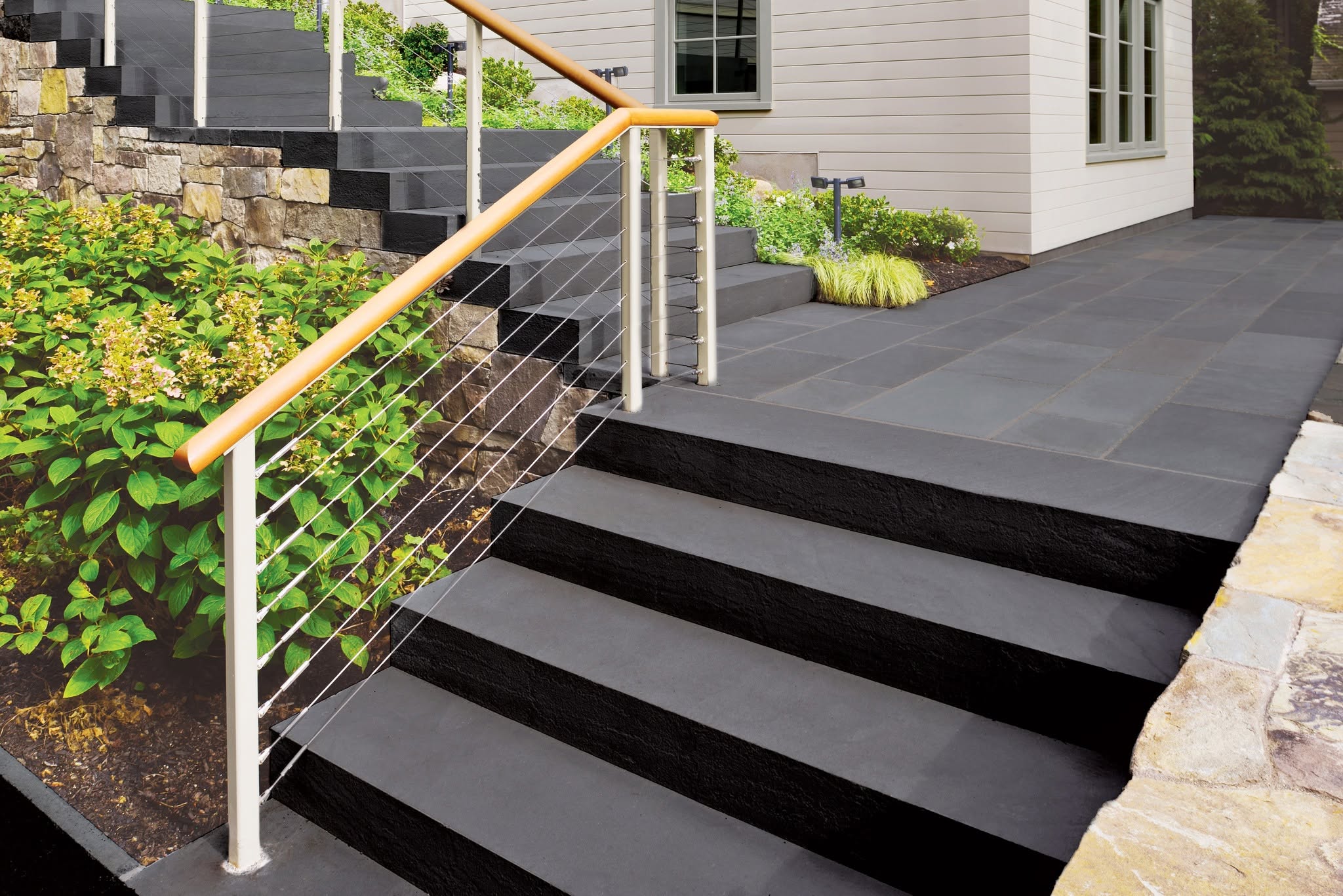 Mockup of Premium Dark Bluestone showcasing refined texture and deep coloration.