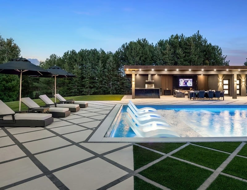Techo-Bloc Industria Smooth pavers used around a modern pool and outdoor living area