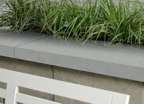 Techo-Bloc Sandstone Cap on retaining wall