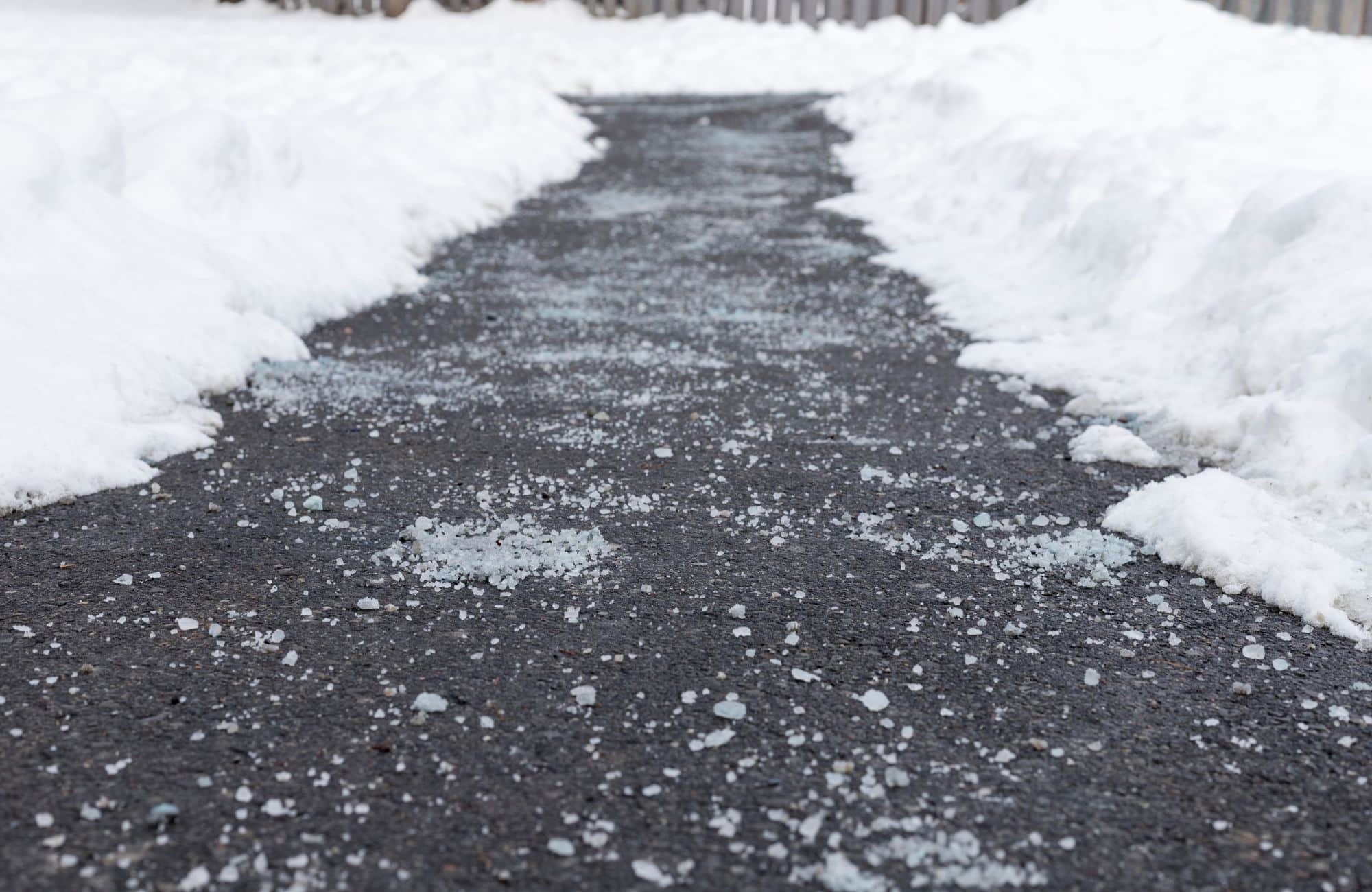 Ice melt salt is one of the most effective tools for clearing icy driveways, sidewalks, and roads. It works by lowering the freezing point of water, helping to melt ice and prevent refreezing. Common types include sodium chloride, calcium chloride, and magnesium chloride, each offering different performance levels in various temperatures. While effective, salt can damage vegetation, concrete, and waterways if overused. For safer results, eco-friendly options like calcium magnesium acetate or sand can reduce environmental impact. Old Station Outdoor & Landscape Supply offers high-quality ice melt salts and green alternatives to keep winter surfaces safe.