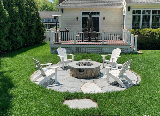 American Mist sawn flagstone patio with circular fire pit.