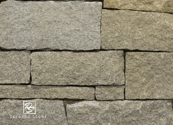 Close-up photo of Dusty Rose Ashlar Natural Thin Stone Veneer texture.
