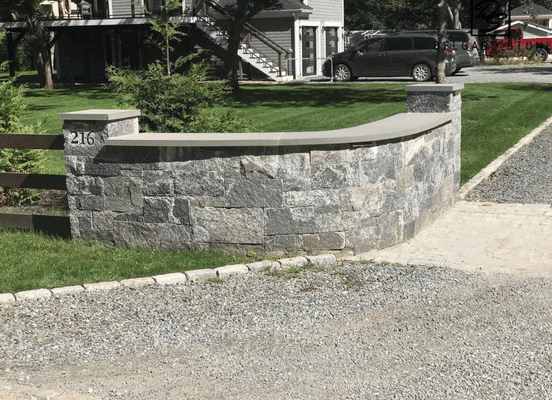 Greenwich Blue natural stone veneer retaining wall installation