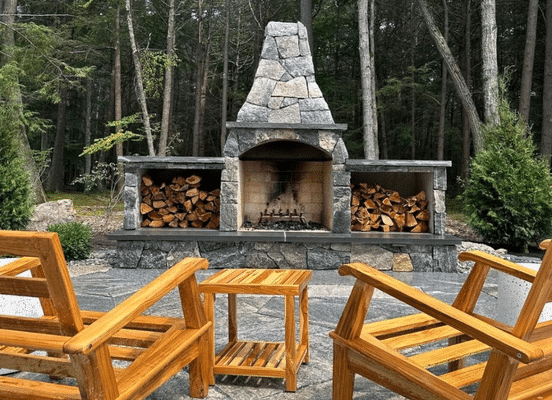 Photo of Liberty Hill Mosaic Natural Thin Stone Veneer installed on an outdoor fireplace.