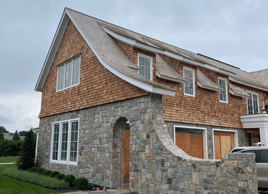 Montauk Blend natural stone veneer residential facade installation