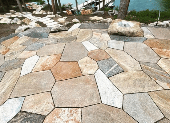 Old New England Wall sawn flagstone patio surface displaying natural color variation and irregular stone pattern.