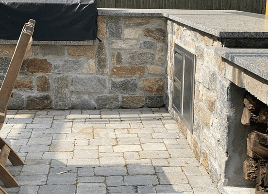 Old New England Wall natural stone veneer outdoor kitchen installation