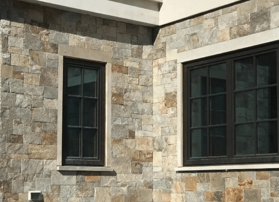 Photo of Colonial Tan Ashlar Natural Thin Stone Veneer installed on an interior accent wall inside a home.