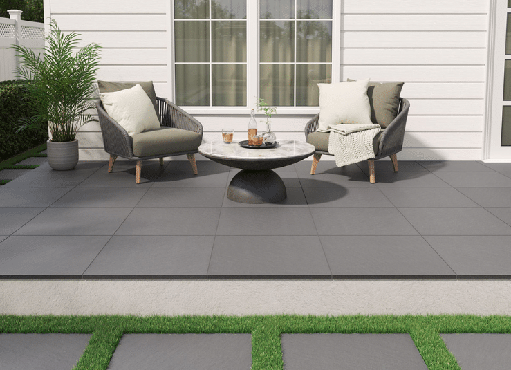 Modern patio with large-format Arterra True Blue porcelain pavers